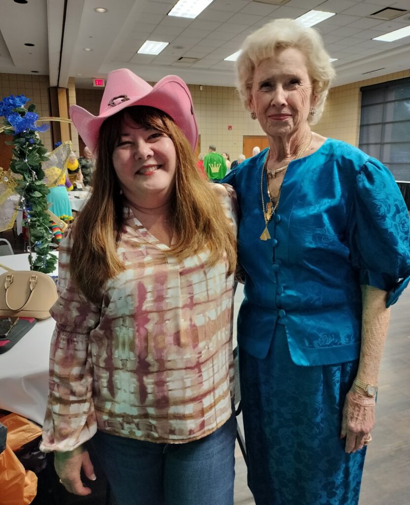 two people smiling