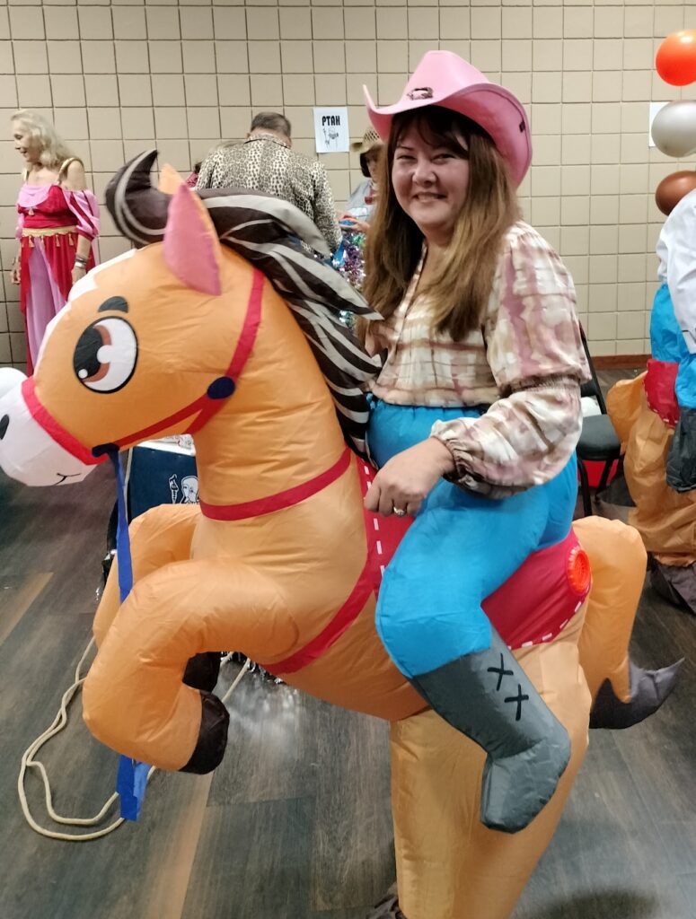person in a blow up horse costume